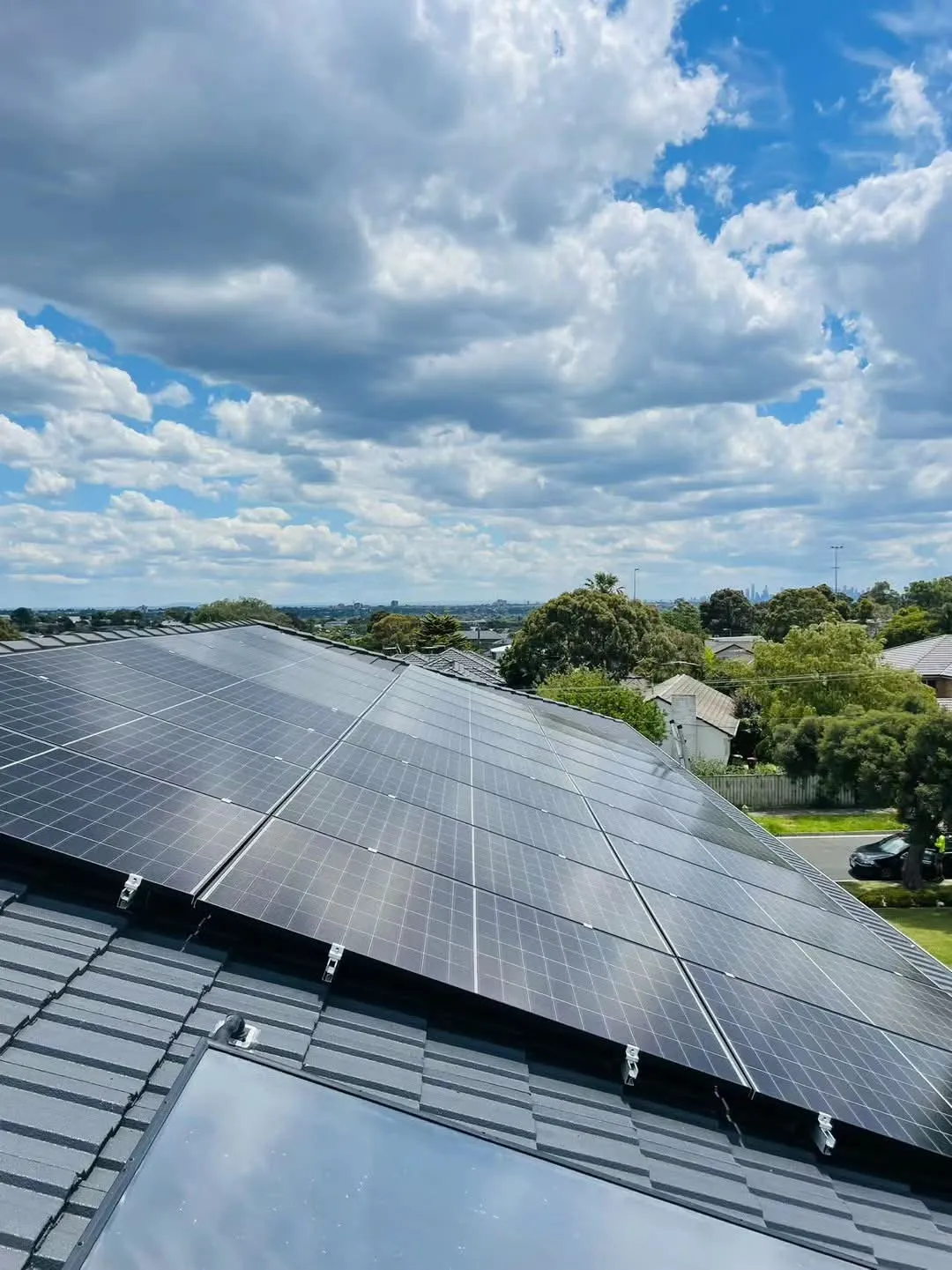 13.2 kW residential solar array under cloudy sky